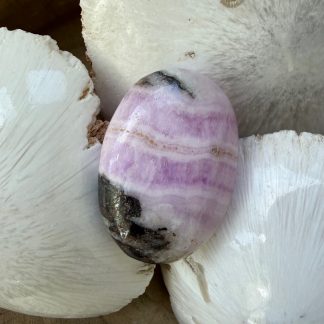 Aragoniet roze handsteen